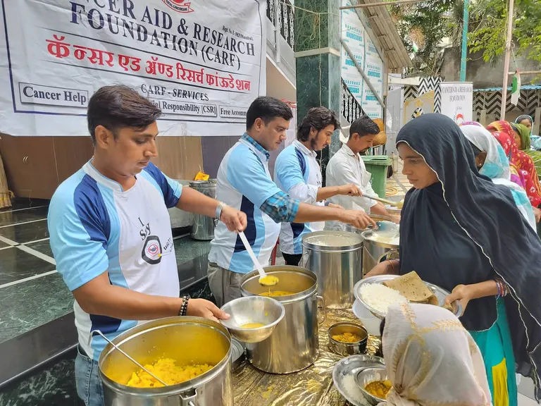 Food Distribution at Noori Musafir Khana, Parel photo gallery cover